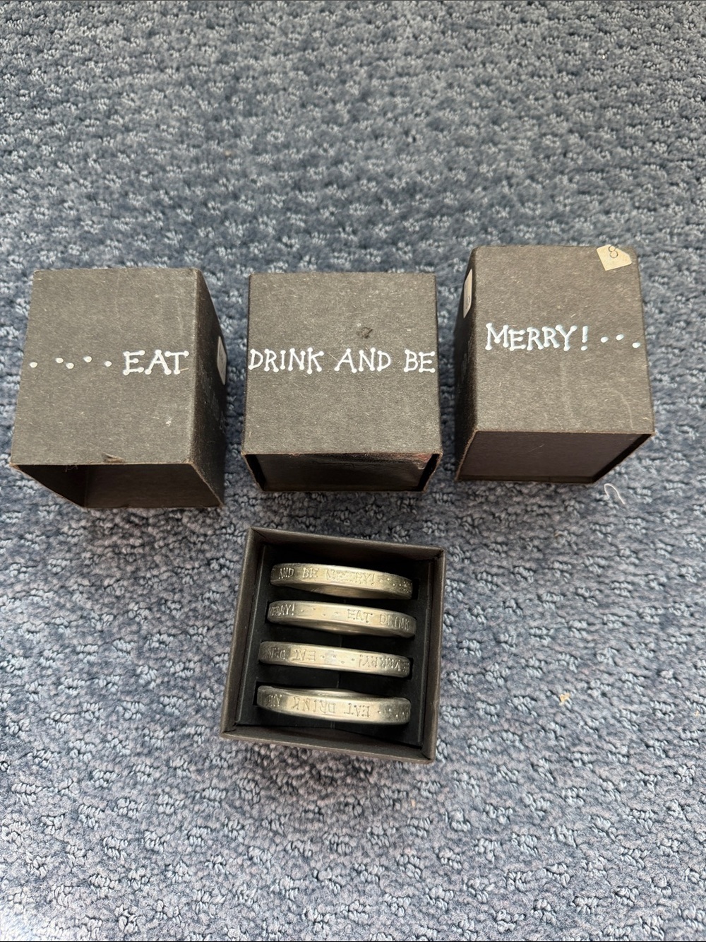 Holiday 'Eat, Drink and Be Merry' silver napkin rings.  Set of 12